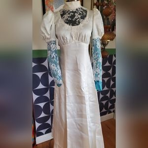 Vintage 1970s unworn packaged and preserved empire waist a line wedding dress.